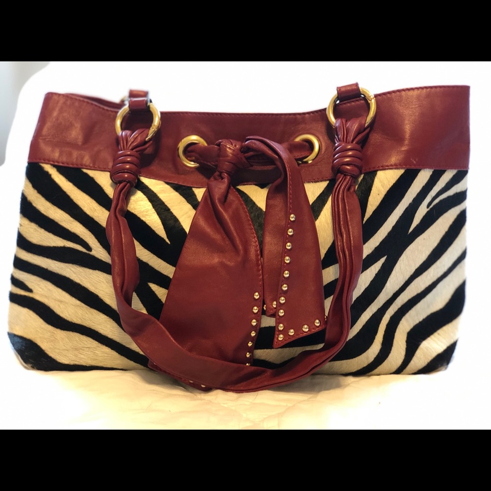 Genuine leather and fur purse.